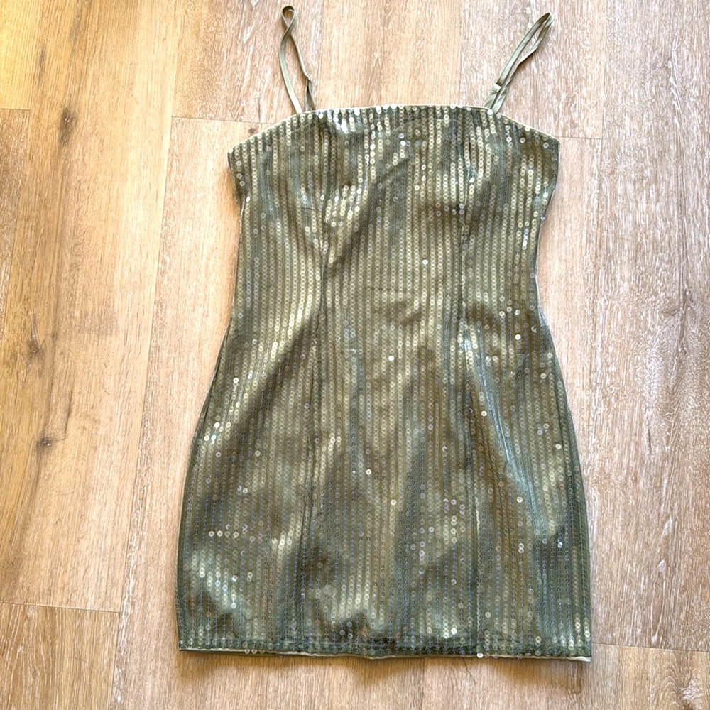 Women’s short strap sequence dress. Wore it once. Beautiful , like brand new.